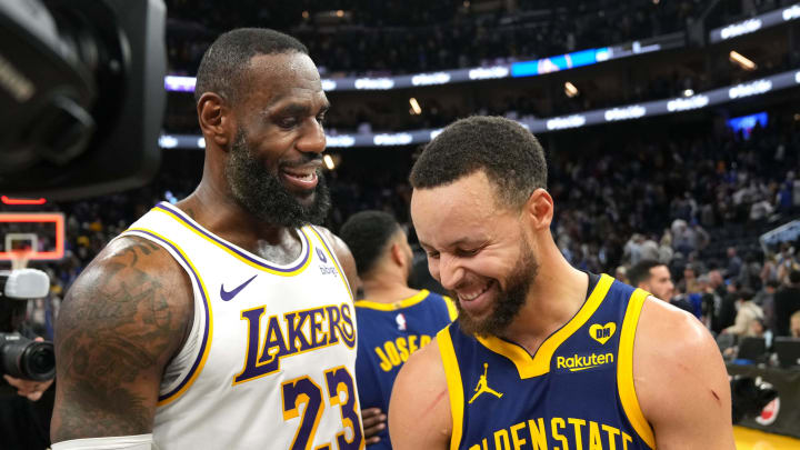 Jan 27, 2024; San Francisco, California, USA; Los Angeles Lakers forward LeBron James (23) and Golden State Warriors guard Stephen Curry (right) talk after the game at Chase Center. 