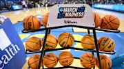 Feb 5, 2025; Los Angeles, California, USA; A rack of basketballs with the March Madness logo before that start of the UCLA Bruins - Ohio State Buckeyes game at Pauley Pavilion presented by Wescom. Mandatory Credit: Robert Hanashiro-Imagn Images