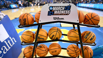 Feb 5, 2025; Los Angeles, California, USA; A rack of basketballs with the March Madness logo before that start of the UCLA Bruins - Ohio State Buckeyes game at Pauley Pavilion presented by Wescom. Mandatory Credit: Robert Hanashiro-Imagn Images