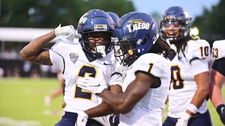 Toledo Rockets wide receiver Junior Vandeross III (2) reacts with Toledo Rockets wide receiver Jerjuan Newton (1) after a touchdown against Mississippi State Bulldogs during the first quarter at Davis Wade Stadium at Scott Field.