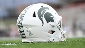 Sep 7, 2024; College Park, Maryland, USA; A detailed view of Michigan State Spartans helmet on the field before the game against the Maryland Terrapins at SECU Stadium. Mandatory Credit: Tommy Gilligan-Imagn Images