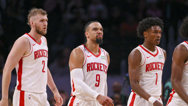 Mar 19, 2024; Washington, District of Columbia, USA;  Houston Rockets forward Dillon Brooks (9) walks off the court with  center Jock Landale (2) and orward Amen Thompson (1) during the second half at Capital One Arena. Mandatory Credit: Tommy Gilligan-USA TODAY Sports