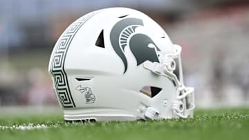 Sep 7, 2024; College Park, Maryland, USA; A detailed view of Michigan State Spartans helmet on the field before the game against the Maryland Terrapins at SECU Stadium. Mandatory Credit: Tommy Gilligan-Imagn Images