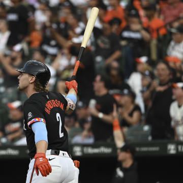 Aug 14, 2024; Baltimore, Maryland, USA; Baltimore Orioles shortstop Gunnar Henderson (2) reacts after hitting a first inning two run home run against the Washington Nationals at Oriole Park at Camden Yards.