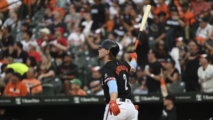 Aug 14, 2024; Baltimore, Maryland, USA; Baltimore Orioles shortstop Gunnar Henderson (2) reacts after hitting a first inning two run home run against the Washington Nationals at Oriole Park at Camden Yards.