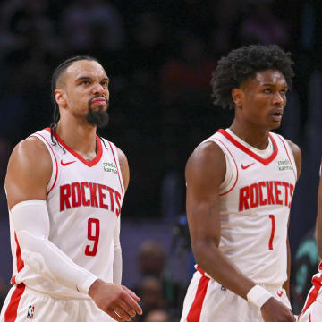 Mar 19, 2024; Washington, District of Columbia, USA;  Houston Rockets forward Dillon Brooks (9) walks off the court with  center Jock Landale (2) and orward Amen Thompson (1) during the second half at Capital One Arena. Mandatory Credit: Tommy Gilligan-USA TODAY Sports