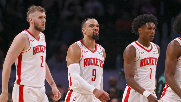 Mar 19, 2024; Washington, District of Columbia, USA;  Houston Rockets forward Dillon Brooks (9) walks off the court with  center Jock Landale (2) and orward Amen Thompson (1) during the second half at Capital One Arena. Mandatory Credit: Tommy Gilligan-USA TODAY Sports