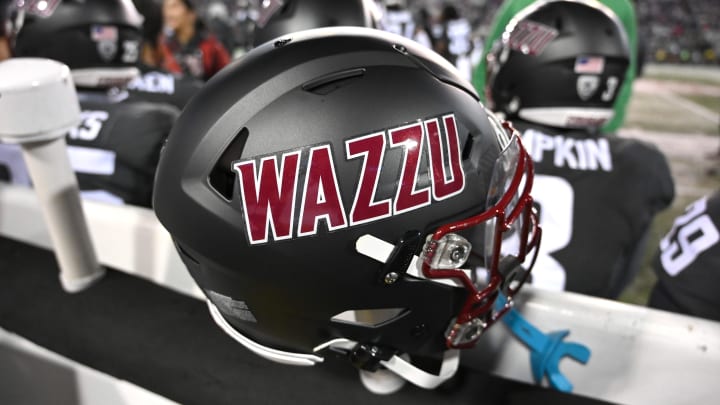 Nov 17, 2023; Pullman, Washington, USA; Washington State Cougars helmet sits during a game against the Colorado Buffaloes in the second half at Gesa Field at Martin Stadium. Mandatory Credit: James Snook-USA TODAY Sports