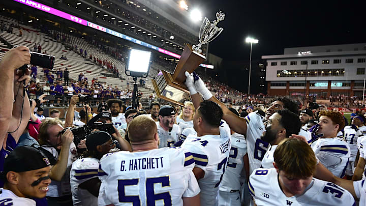 Sep 20, 2025; Pullman, Washington, USA; Washington Huskies celebrate after a game against the Washington State Cougars at Gesa Field at Martin Stadium. Washington Huskies won 59-24. Mandatory Credit: James Snook-Imagn Images
