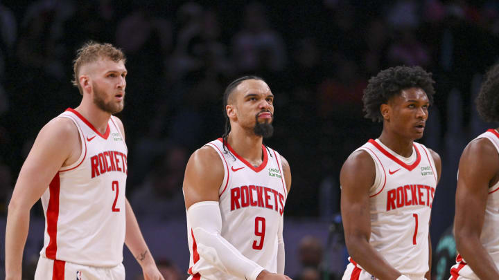 Mar 19, 2024; Washington, District of Columbia, USA;  Houston Rockets forward Dillon Brooks (9) walks off the court with  center Jock Landale (2) and orward Amen Thompson (1) during the second half at Capital One Arena. Mandatory Credit: Tommy Gilligan-USA TODAY Sports