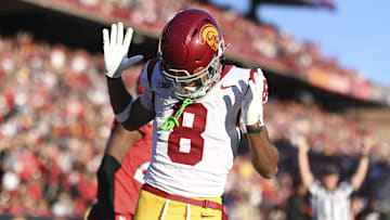 Oct 19, 2024; College Park, Maryland, USA; Southern California Trojans wide receiver Ja'Kobi Lane (8) celebrates after scoring a first half touchdown against the Maryland Terrapins  at SECU Stadium. Mandatory Credit: Tommy Gilligan-Imagn Images