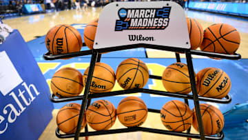 Feb 5, 2025; Los Angeles, California, USA; A rack of basketballs with the March Madness logo before that start of the UCLA Bruins - Ohio State Buckeyes game at Pauley Pavilion presented by Wescom. Mandatory Credit: Robert Hanashiro-Imagn Images