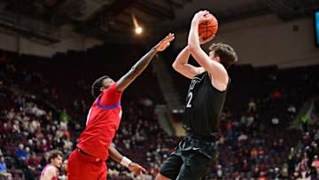 Feb 5, 2025; Virginia Tech guard Jaden Schutt (2) shoots a shot as SMU guard Chuck Harris (3) defends.