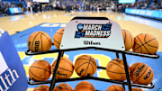A rack of basketballs with the March Madness logo before that start of the UCLA Bruins - Ohio State Buckeyes game at Pauley Pavilion presented by Wescom. 
