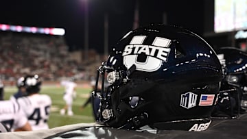 Utah State Aggies helmet sits during a game against the Washington State Cougars in the second half at Gesa Field at Martin Stadium.