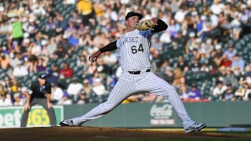 May 10, 2025; Denver, Colorado, USA; Colorado Rockies pitcher Bradley Blalock (64) delivers a pitch in at the first inning agains the San Diego Padres at Coors Field. Mandatory Credit: John Leyba-Imagn Images