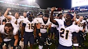 Toledo Rockets players react after defeating the Mississippi State Bulldogs.