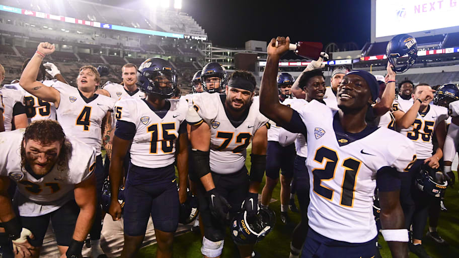 Toledo Rockets players react after defeating the Mississippi State Bulldogs. | Matt Bush-Imagn Images