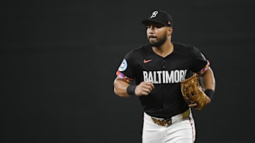 Sep 20, 2024; Baltimore, Maryland, USA;  Baltimore Orioles outfielder Anthony Santander (25) runs to the dugout after the top of the second inning against the Detroit Tigers at Oriole Park at Camden Yards. Mandatory Credit: Tommy Gilligan-Imagn Images