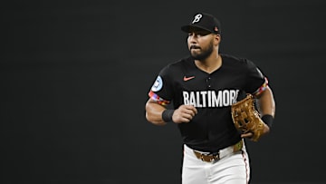 Sep 20, 2024; Baltimore, Maryland, USA;  Baltimore Orioles outfielder Anthony Santander (25) runs to the dugout after the top of the second inning against the Detroit Tigers at Oriole Park at Camden Yards. Mandatory Credit: Tommy Gilligan-Imagn Images