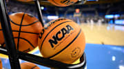 A rack of basketballs with the NCAA logo before that start of the UCLA Bruins - Ohio State Buckeyes game at Pauley Pavilion presented by Wescom.