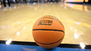 A basketball with the March Madness logo before that start of the UCLA Bruins - Ohio State Buckeyes game at Pauley Pavilion presented by Wescom. 