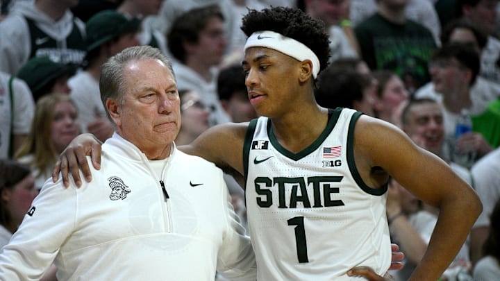 Mar 9, 2025; East Lansing, Michigan, USA; Michigan State Spartans head coach Tom Izzo huddles with Michigan State Spartans guard Jeremy Fears Jr. (1) during the second half against the Michigan Wolverines at Jack Breslin Student Events Center. Mandatory Credit: Dale Young-Imagn Images Mar 9, 2025; East Lansing, Michigan, USA; Michigan State Spartans head coach Tom Izzo huddles with Michigan State Spartans guard Jeremy Fears Jr. (1) during the second half against the Michigan Wolverines at Jack Breslin Student Events Center. Mandatory Credit: Dale Young-Imagn Images