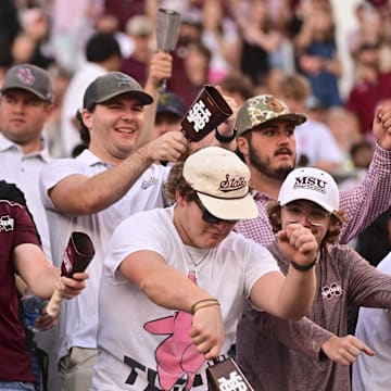 Mississippi State Bulldogs fans cheer during the fourth quarter against the Texas A&M Aggies at Davis Wade Stadium at Scott Field.