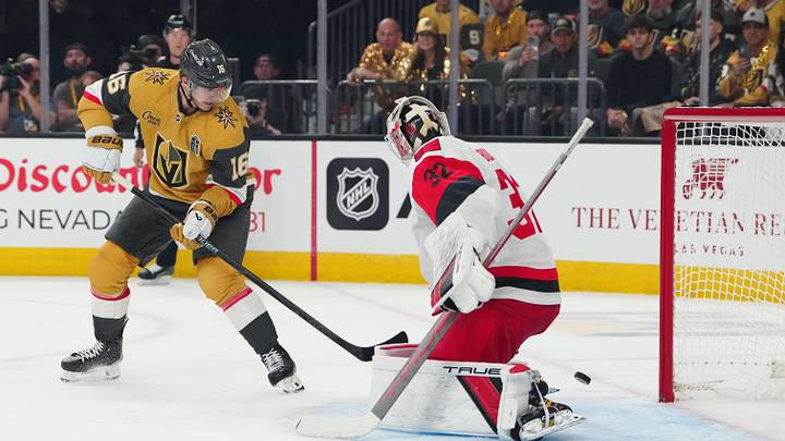 Jun 14, 2026; Las Vegas, Nevada, USA; Carolina Hurricanes goaltender Brandon Bussi (32) defends against Vegas Golden Knights right wing Pavel Dorofeyev (16) during the first period in game six of the 2026 Stanley Cup Final at T-Mobile Arena. Mandatory Credit: Stephen R. Sylvanie-Imagn Images