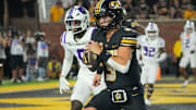 Aug 28, 2025; Columbia, Missouri, USA; Missouri Tigers quarterback Beau Pribula (9) runs in for a touchdown against the Central Arkansas Bears during the second half of the game at Faurot Field at Memorial Stadium. Mandatory Credit: Denny Medley-Imagn Images