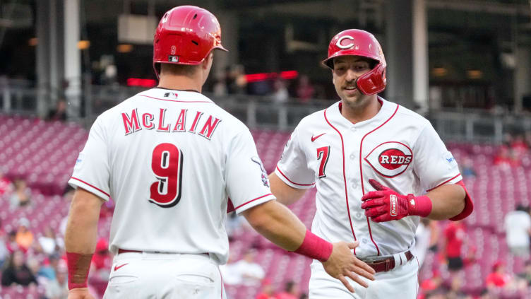 Cincinnati Reds first baseman Spencer Steer (7) crosses plate