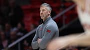 Mar 4, 2025; Salt Lake City, Utah, USA; Utah Utes guard head coach Josh Eilert watches play against the West Virginia Mountaineers during the first half at Jon M. Huntsman Center. Mandatory Credit: Rob Gray-Imagn Images