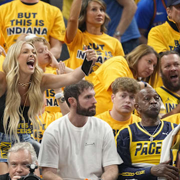Jade Jones (center), girlfriend of Indiana Pacers guard Tyrese Haliburton (not pictured), cheers during the first half during game three of the 2025 NBA Finals against the Oklahoma City Thunder at Gainbridge Fieldhouse.