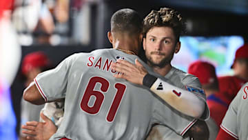 Philadelphia Phillies' Trea Turner and Cristopher Sánchez