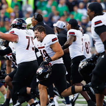 Northern Illinois celebrates after winning a NCAA college football game 16-14 against Notre Dame at Notre Dame Stadium on Saturday, Sept. 7, 2024, in South Bend.