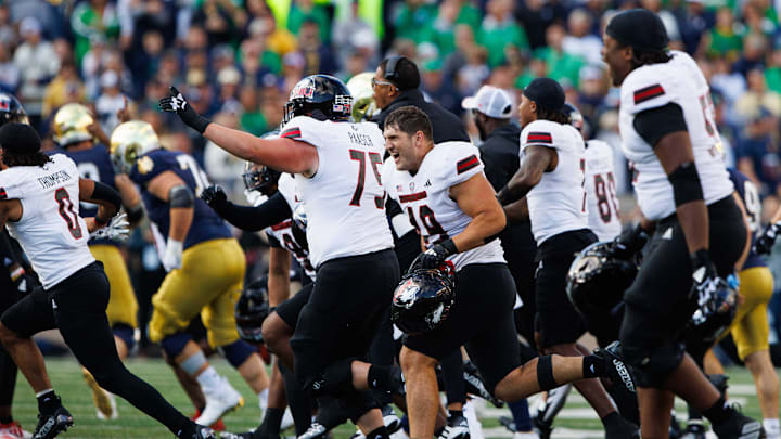 Northern Illinois celebrates after winning a NCAA college football game 16-14 against Notre Dame at Notre Dame Stadium on Saturday, Sept. 7, 2024, in South Bend.