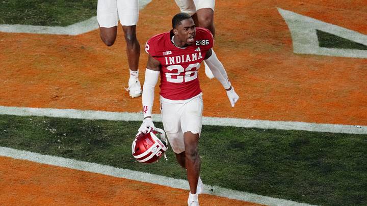 Jan 19, 2026; Miami Gardens, FL, USA; Indiana Hoosiers defensive back Jamari Sharpe (22) celebrates after making an interception against the Miami Hurricanes during the second half of the College Football Playoff National Championship game at Hard Rock Stadium. Mandatory Credit: James Lang-Imagn Images