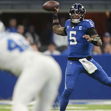 Nov 24, 2024; Indianapolis, Indiana, USA; Indianapolis Colts quarterback Anthony Richardson (5) draws back for a pass during a game against the Detroit Lions at Lucas Oil Stadium. Mandatory Credit: Christine Tannous/USA TODAY Network via Imagn Images