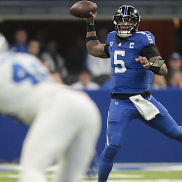 Nov 24, 2024; Indianapolis, Indiana, USA; Indianapolis Colts quarterback Anthony Richardson (5) draws back for a pass during a game against the Detroit Lions at Lucas Oil Stadium. Mandatory Credit: Christine Tannous/USA TODAY Network via Imagn Images