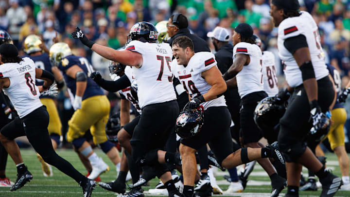 Northern Illinois celebrates after winning a NCAA college football game 16-14 against Notre Dame at Notre Dame Stadium on Saturday, Sept. 7, 2024, in South Bend.