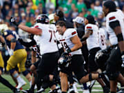 Northern Illinois celebrates beating Notre Dame 16–14.