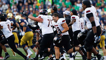 Northern Illinois celebrates after winning a NCAA college football game 16-14 against Notre Dame at Notre Dame Stadium on Saturday, Sept. 7, 2024, in South Bend.