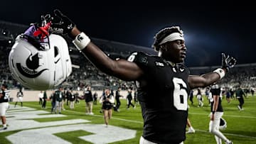Sep 6, 2025; East Lansing, Michigan, USA; Michigan State wide receiver Nick Marsh (6) celebrates a double-overtime victory over Boston College at Spartan Stadium. Mandatory Credit: Brendan Mullin-Imagn Images