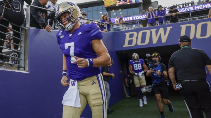 Aug 31, 2024; Seattle, Washington, USA; Washington Huskies quarterback Will Rogers (7) participates in pregame warmups against the Weber State Wildcats at Alaska Airlines Field at Husky Stadium. Mandatory Credit: Joe Nicholson-USA TODAY Sports