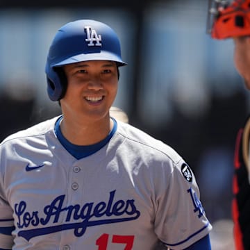 San Francisco, California, USA; Los Angeles Dodgers starting pitcher Shohei Ohtani (17) greets San Francisco Giants catcher Patrick Bailey (right) before batting during the first inning at Oracle Park.
