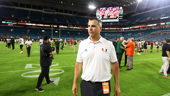 Sep 7, 2024; Miami Gardens, Florida, USA; Miami Hurricanes head coach Mario Cristobal looks on from the field after the game against the Florida A&M Rattlers at Hard Rock Stadium. Mandatory Credit: Sam Navarro-Imagn Images