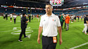 Sep 7, 2024; Miami Gardens, Florida, USA; Miami Hurricanes head coach Mario Cristobal looks on from the field after the game against the Florida A&M Rattlers at Hard Rock Stadium. Mandatory Credit: Sam Navarro-Imagn Images
