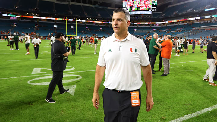 Sep 7, 2024; Miami Gardens, Florida, USA; Miami Hurricanes head coach Mario Cristobal looks on from the field after the game against the Florida A&M Rattlers at Hard Rock Stadium. Mandatory Credit: Sam Navarro-Imagn Images