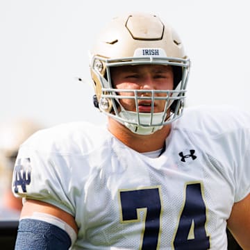 Notre Dame offensive lineman Billy Schrauth participates in a drill during a Notre Dame football practice at Irish Athletic Center on Tuesday, Aug. 6, 2024, in South Bend.
