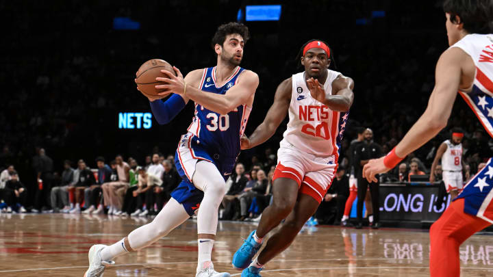 Apr 9, 2023; Brooklyn, New York, USA; Philadelphia 76ers guard Furkan Korkmaz (30) drives to the basket against the Brooklyn Nets during the first quarter at Barclays Center. Mandatory Credit: John Jones-USA TODAY Sports